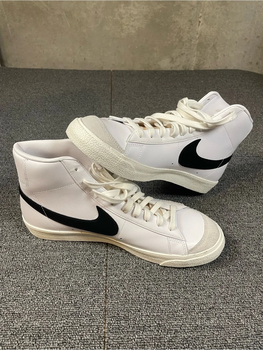 Men’s Nike White High-Top Sneakers with Black Swoosh